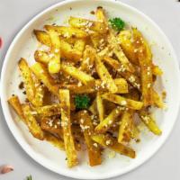 Garlic Parm Petition Fries · Idaho potato fries cooked until golden brown and garnished with garlic, salt, and parmesan c...