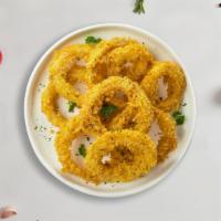 Motion For Onion Rings · Sliced onions dipped in a light batter and fried until crispy and golden brown.