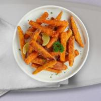 Sweety Potato Fries · Thick-cut sweet potato wedges fried until golden brown