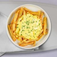 Truthful Truffle Fries · (Vegetarian) Idaho potato fries cooked until golden brown and garnished with salt, truffle o...