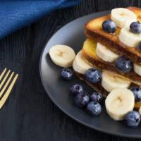 Blueberry Banana French Toast · 2 slices of Classic French Toast freshly prepared and cooked to perfection. Topped with fres...