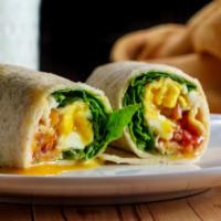 Bacon Breakfast Burrito · A mouthwatering Breakfast burrito made with Flour tortilla and filled with scrambled eggs, r...