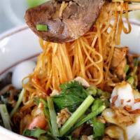 42. Cambodia seafood rice noodle  · Hu tieu nam vang kho/ nuoc