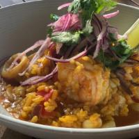 Seafood Paella · Peruvian style, bomba rice, saffron-paprika base