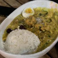 Aji de Gallina · Peruvian chicken stew in aji amarillo base with jasmine rice and egg.