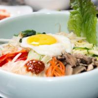 BiBimBap 비빔밥 · An assortment of Seasoned Vegetables and fried egg over Rice with Your Choice of BBQ Meats.
