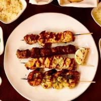 FAMILY MEAL PACKAGE ( 4 people) · 4 SKEWER CHOICE OF KEBABS (Lamb Tender Kebab, Chicken Tender Kebab, Salmon Kebab, Prawns Keb...