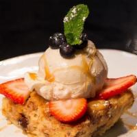 BREAD PUDDING W/ VANILLA GELATO · With chocolate chips, date, caramel sauce