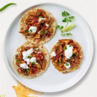Taco Trio · Build your own tacos with your choice of meat, beans, and salsa