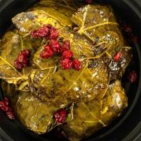 Dolmeh · grape leaves, rice, herbs, beef, lentils.