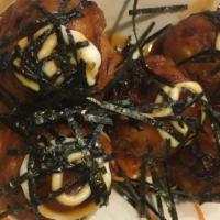 Takoyaki (5 Pieces) · Deep fried octopus balls topped with mayonnaise, teriyaki sauce and nori.