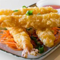 Tempura Shrimp (4 Pieces) · Deep fried tempura battered shrimp; served with sweet chili sauce