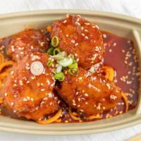 Flaming Nuggets (6 Pieces) · Chicken nuggets tossed with sesame seeds and our spicy firecracker sauce with honey.