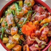 Ying Yang Poke Bowl · Half Spicy Ahi and half Mango Salmon; tossed with green onions and cilantro and topped with ...
