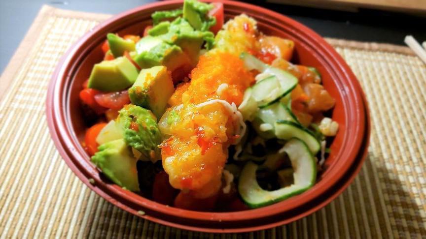 Shrimp Surfer Poke Bowl · Salmon tossed with green onion and cilantro. Comes with imitation crab, cucumber, seaweed salad, pineapple, and is topped with a shrimp tempura, masago, Sweet Chili Sauce, and Teri Mayo.
Served over our choice of rice or salad.