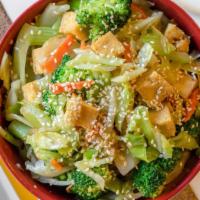 Vegetable Tofu Hot Bowl · Wok-fried mixed greens (cabbage, onion, carrot, celery, broccoli) with lightly fried tofu cu...