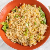 Salted Salmon Fried Rice · Fried rice with salted salmon, lettuce, yellow onion, and green onions.