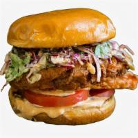 Signature Fried Chicken Sandwich · Buttermilk fried chicken sandwich with slaw, tomatoes, pickles, onions, and a chipotle mayo....