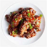Fried Korean Chicken Wings · Six bone-in wings tossed in house sweet-spicy sauce, tossed with sesame seeds, scallions and...