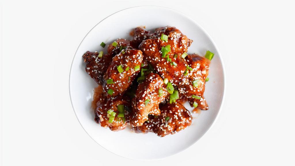 Fried Korean Chicken Wings · Six bone-in wings tossed in house sweet-spicy sauce, tossed with sesame seeds, scallions and served with dipping sauce.