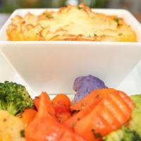 Shepherds Pie · Ground beef with root vegetables in a rich gravy, topped with creamy mash, carrots.