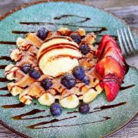 Caramei Mochi Waffle With One Scoop Of Ice Cream · Japanese style mochi waffle,  gummy and chewy, delicious with whipped cream, Fruit  or ice c...