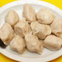 Dumplings (10 Pieces) · Choice of special shan dong pork and vegetable, broiled pork with leeks, vegetarian, or chic...