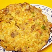 Vegetarian Egg Foo Yung
 · Meat can be added with additional charge