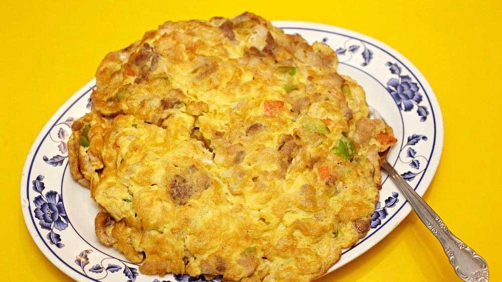 Vegetarian Egg Foo Yung
 · Meat can be added with additional charge