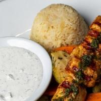 CHICKEN KEBAB COMBO PLATE · Chicken kebab, rice pilaf, sautéed vegetables and tzatziki sauce