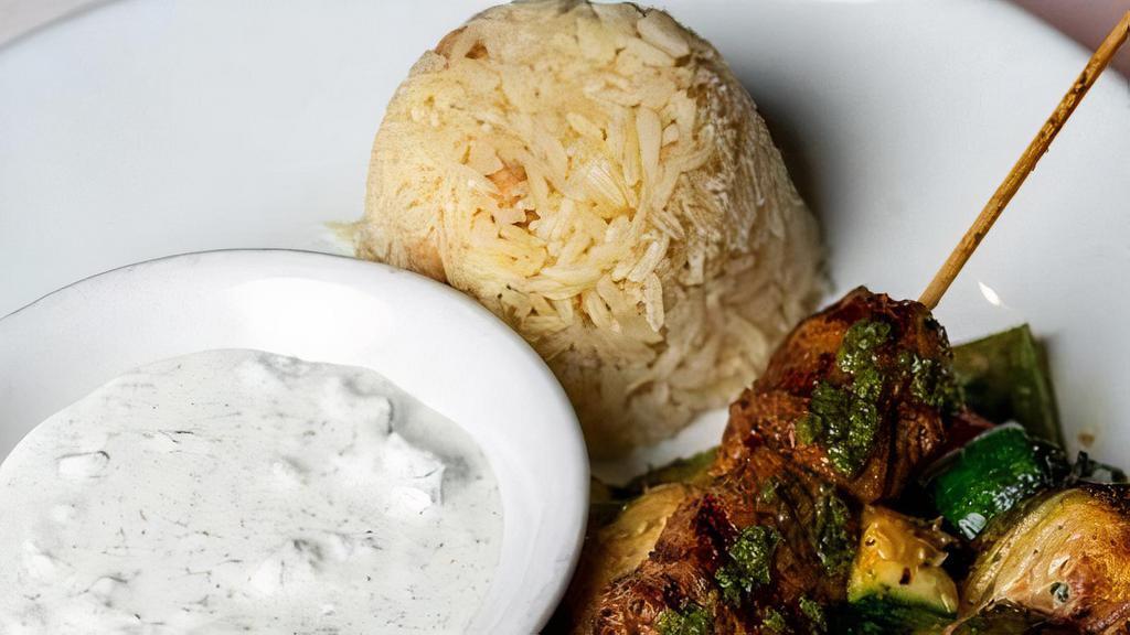 LAMB KEBAB COMBO PLATE · Lamb tender kebab, rice pilaf, sautéed vegetables and tzatziki sauce