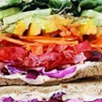 Sonoma Veggie Sandwich · Mushrooms, avocado, grilled red onion, provolone, basil aioli, argula, on a ciabatta roll<br...