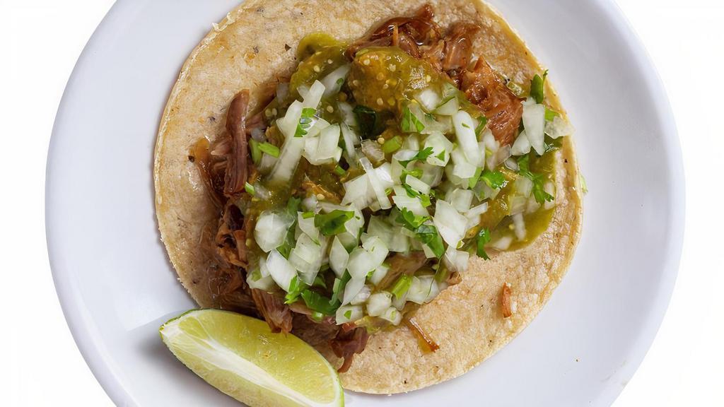 CARNITAS Tacos · three pulled pork tacos on house-made tortillas, cilantro, onions, salsa roja