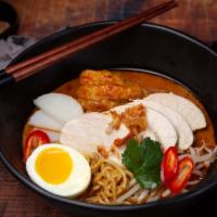 Laksa Curry Chicken Noodle Soup · Braised Chicken Leg and Thigh, Wavy Ramen Noodles, Curry Broth, Egg, Sweet Potato,  Fried Be...