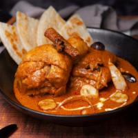 Massaman Chicken Curry · Slow Cook Chicken Leg, Coconut Base Curry, Roasted Peanut, Sweet Potato, Onion, Ginger Strip...