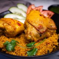 Chicken Biryani Rice · Braised Chicken Leg, Puffed Turmeric Curry Rice, Cucumber, Fried Shallot, Cilantro, Tomato a...
