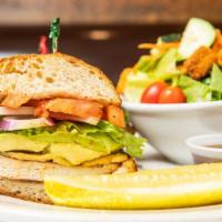 Chicken & Avocado Sandwich · Grilled chicken topped with smoked gouda, avocado, lettuce, tomato and onion on a sourdough ...