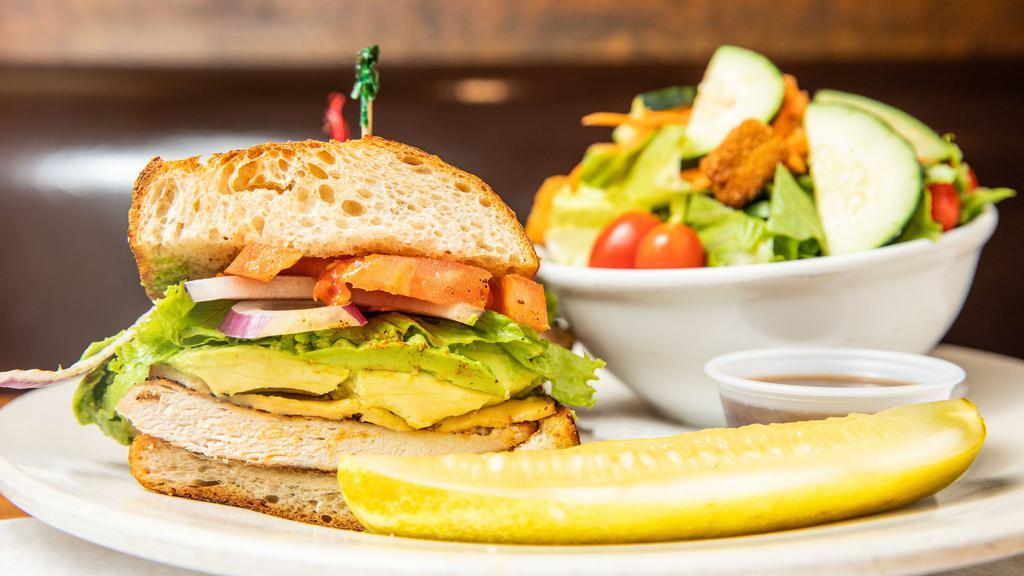 Chicken & Avocado Sandwich · Grilled chicken topped with smoked gouda, avocado, lettuce, tomato and onion on a sourdough roll.