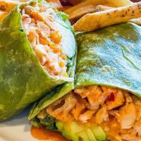 Thai Chicken Wrap · A spinach flour tortilla filled with chicken tossed in a Thai chili sauce, avocado, lettuce,...
