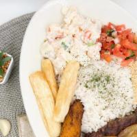 Coulette beef with onions (Picanha Acebolada) · Served with beans, rice, fried yucca, fried banana, cassava flour, brazilian potato salad an...