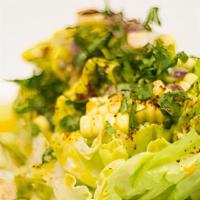 Ensalada de Lechuga y Elote · Vegetarian. organic butter lettuce, corn, cotija cheese, chile ancho dust,
serrano chile vin...
