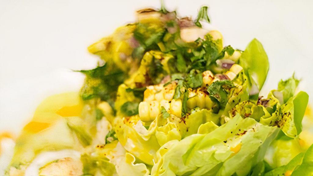 Ensalada de Lechuga y Elote · Vegetarian. organic butter lettuce, corn, cotija cheese, chile ancho dust,
serrano chile vinaigrette.