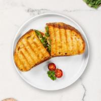 Turkey Turn Up Panini · Lettuce, pickles, pesto, Swiss cheese, turkey and mayo on ciabatta bread.