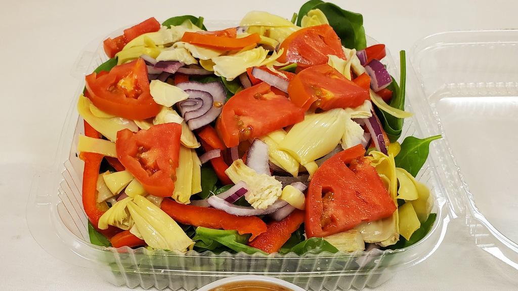 Spinach Salad · Fresh Baby Spinach, Marinated Artichokes Hearts, Red Onions, Green Peppers, Black Olives, Mozzarella Cheese & Fresh Tomatoes.