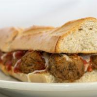Meatball Sandwich · Marinara Sauce, Sliced Meatballs & Cheese baked on french roll