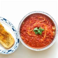 Spaghetti with Sauce · Served with side salad and garlic bread.