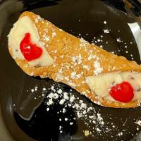 Cannoli · Delicious tube of fried dough, filled with a sweet, creamy ricotta filling. (1 Piece)