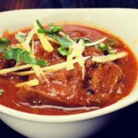 Goat Curry · Goat meat cooked in a onion-tomato gravy