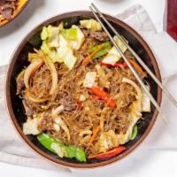 Japchae · Wok-fried, clear, sweet potato starch noodles with snow peas, cabbage, red bell peppers, oni...