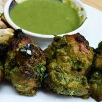 Minty Chicken Tikka (6 Tikka) · Gluten free. Chicken breast pieces fillet flavored with mint, herbs and spices skewered in a...
